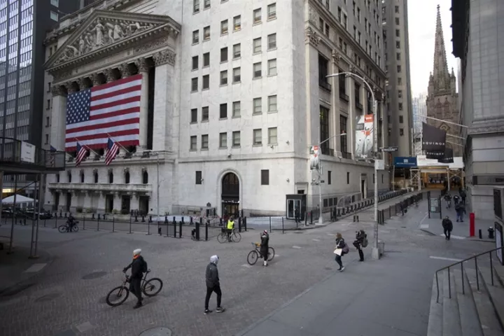 Ράλι 1.400 μονάδων ο Dow Jones εν αναμονή του νομοσχεδίου για τον κορονοϊό